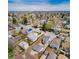 Spacious suburban homes are pictured in this aerial view of the neighborhood on a sunny day at 4325 S Cherokee St, Englewood, CO 80110