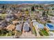 An aerial view of a residential community with mature landscaping and street parking at 4325 S Cherokee St, Englewood, CO 80110