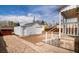 Backyard featuring rock landscaping and a one-car garage at 4325 S Cherokee St, Englewood, CO 80110