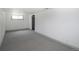 Spacious finished basement with neutral carpet and a window at 4325 S Cherokee St, Englewood, CO 80110