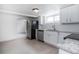 Contemporary kitchen with stainless steel appliances and ample counter space at 4325 S Cherokee St, Englewood, CO 80110