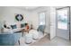 Comfortable living room features stylish seating, natural light, and a welcoming entryway for a cozy atmosphere at 4325 S Cherokee St, Englewood, CO 80110