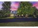 Charming home nestled among mature trees at 6451 Crestbrook Dr, Morrison, CO 80465