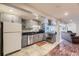 Kitchen featuring stainless steel appliances and light gray cabinets at 6451 Crestbrook Dr, Morrison, CO 80465
