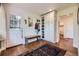Mudroom with storage, a bench and hardwood floors at 6451 Crestbrook Dr, Morrison, CO 80465