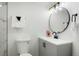 Stylish bathroom featuring modern fixtures, vanity, and toilet at 8701 Huron St # 2-106, Thornton, CO 80260
