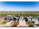 Stunning aerial view showcasing the neighborhood, lush green spaces, and well-maintained homes in the community at 2355 Saddle Back Ct, Fort Lupton, CO 80621