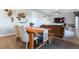 Stylish dining area featuring wood floors and modern decor at 2355 Saddle Back Ct, Fort Lupton, CO 80621