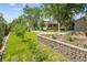 Landscaped yard with lush greenery and a charming single-Gathering home with inviting curb appeal at 3570 E Arapahoe Pl, Centennial, CO 80122