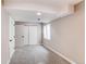 Finished basement bedroom with carpeted floors, a closet, and a window for natural light at 5597 S Buchanan St, Aurora, CO 80016