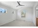 Bedroom with neutral carpeting and abundant natural light at 701 N Roslyn St # 36, Denver, CO 80230