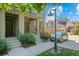 Charming townhome entrance with landscaped walkway and garden at 701 N Roslyn St # 36, Denver, CO 80230