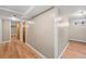 Finished basement area featuring neutral-toned walls, updated flooring, and plenty of natural light at 2606 W Alamo Ave, Littleton, CO 80120