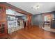 Vintage living room featuring beautiful wood trim, hardwood floors and grey walls at 2606 W Alamo Ave, Littleton, CO 80120