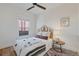 Bright bedroom with a comfy bed, a ceiling fan, and a light-filled window at 288 S Sherman St, Denver, CO 80209