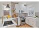 Stylish kitchen with stainless steel appliances, modern countertops, and ample cabinet space at 288 S Sherman St, Denver, CO 80209