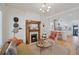 Inviting living room with a decorative fireplace and an open layout to the kitchen at 288 S Sherman St, Denver, CO 80209