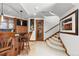Finished basement with wet bar, wine cellar, and staircase at 9977 Elkhorn St, Littleton, CO 80127