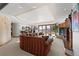 Finished basement with sectional sofa and fireplace at 9977 Elkhorn St, Littleton, CO 80127