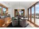 Charming breakfast nook with scenic views and hardwood floors at 9977 Elkhorn St, Littleton, CO 80127
