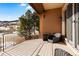 Relaxing deck with mountain views and comfortable wicker seating at 9977 Elkhorn St, Littleton, CO 80127