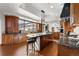 Bright kitchen with stainless steel appliances and breakfast bar at 9977 Elkhorn St, Littleton, CO 80127