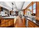 Modern kitchen with stainless steel appliances and granite counters at 9977 Elkhorn St, Littleton, CO 80127