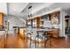 Large kitchen with island, stainless steel appliances, and granite counters at 9977 Elkhorn St, Littleton, CO 80127