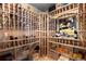 Large wine cellar with extensive storage for bottles at 9977 Elkhorn St, Littleton, CO 80127