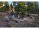 A charming fire pit area perfect for outdoor gatherings surrounded by scenic nature at 44 Linn Ln, Golden, CO 80403