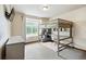 Cozy bedroom featuring a stylish loft bed with desk, perfect for studying and relaxation at 19640 Four Winds Way, Monument, CO 80132