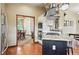 Kitchen with stone countertops, stainless steel appliances, and eating area at 19640 Four Winds Way, Monument, CO 80132