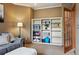 Living room with built in bookshelves and a comfortable seating area at 19640 Four Winds Way, Monument, CO 80132