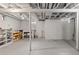 A large unfinished basement space with ample storage at 3075 N Elm Ave, Denver, CO 80207