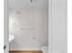 Neutral powder room with floating sink, modern hardware, and neutral paint; a serene and functional space at 9590 E Florida Ave # 1025, Denver, CO 80247