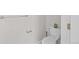 Neutral bathroom with modern toilet, towel bar, and decorative accents; a serene and functional space at 9590 E Florida Ave # 1025, Denver, CO 80247