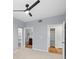 Bedroom with carpet and view to bathroom and walk-in closet with shelves at 9590 E Florida Ave # 1025, Denver, CO 80247