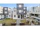 Modern multi-story home featuring geometric design, neutral color palette, and low-maintenance landscaping at 1930 W 35Th Ave, Denver, CO 80211