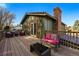 Outdoor deck with seating, perfect for entertaining and enjoying the views at 4468 S Zenobia St, Denver, CO 80236