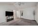 Bedroom featuring vaulted ceiling, neutral carpet, and ample natural light, perfect for relaxation and comfort at 1655 S Buckley Cir, Aurora, CO 80017