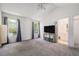 Spacious bedroom with vaulted ceiling and large windows, adjacent bathroom provides convenience and comfort at 1655 S Buckley Cir, Aurora, CO 80017