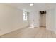 Light-filled bedroom offers wood-look floors and a closet at 5780 W 5Th Ave, Lakewood, CO 80226
