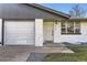 Charming exterior of a well-maintained home with a two-car garage and landscaped front yard at 5780 W 5Th Ave, Lakewood, CO 80226