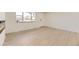 Open-concept room with natural light and modern flooring at 5780 W 5Th Ave, Lakewood, CO 80226