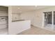 An open living space that has sliding glass doors to the patio at 5780 W 5Th Ave, Lakewood, CO 80226