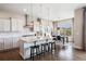 Well-lit kitchen featuring stainless steel appliances, a kitchen island, and pendant lighting at 10659 Montecito Dr, Lone Tree, CO 80124