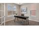 Bright office with a large desk, natural light, and a modern aesthetic at 10659 Montecito Dr, Lone Tree, CO 80124