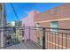 Balcony with black iron railings, overlooking the buildings in the surrounding neighborhood at 2501 15Th St # 3F, Denver, CO 80211