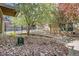 Charming courtyard area featuring mature trees, landscaping, with patio, and access to the building at 2501 15Th St # 3F, Denver, CO 80211