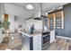 Contemporary kitchen with an island, modern appliances, and an open design for easy entertaining and cooking at 2501 15Th St # 3F, Denver, CO 80211